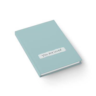 teal hardcover journal notebook with the words, you are loved