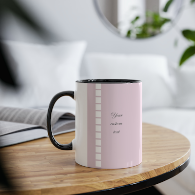 pink ceramic mug with vertical row of white squares. words which you can customise with your own personal words. black handle and black inside.