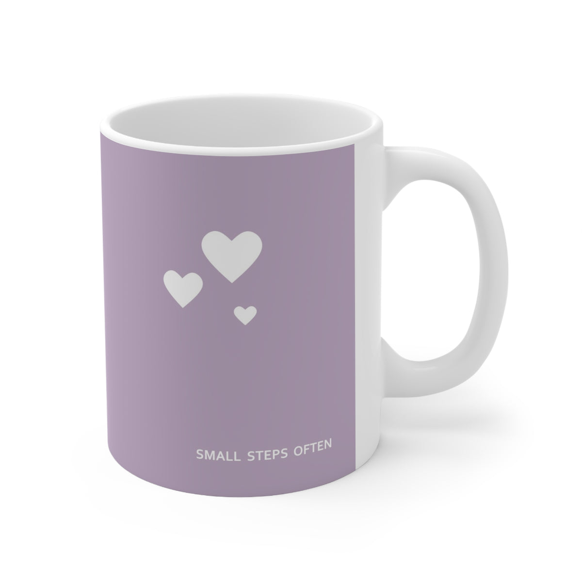 Right side view of purple ceramic white hearts mug, 15oz size, showing ‘Small steps often’ text and handle
