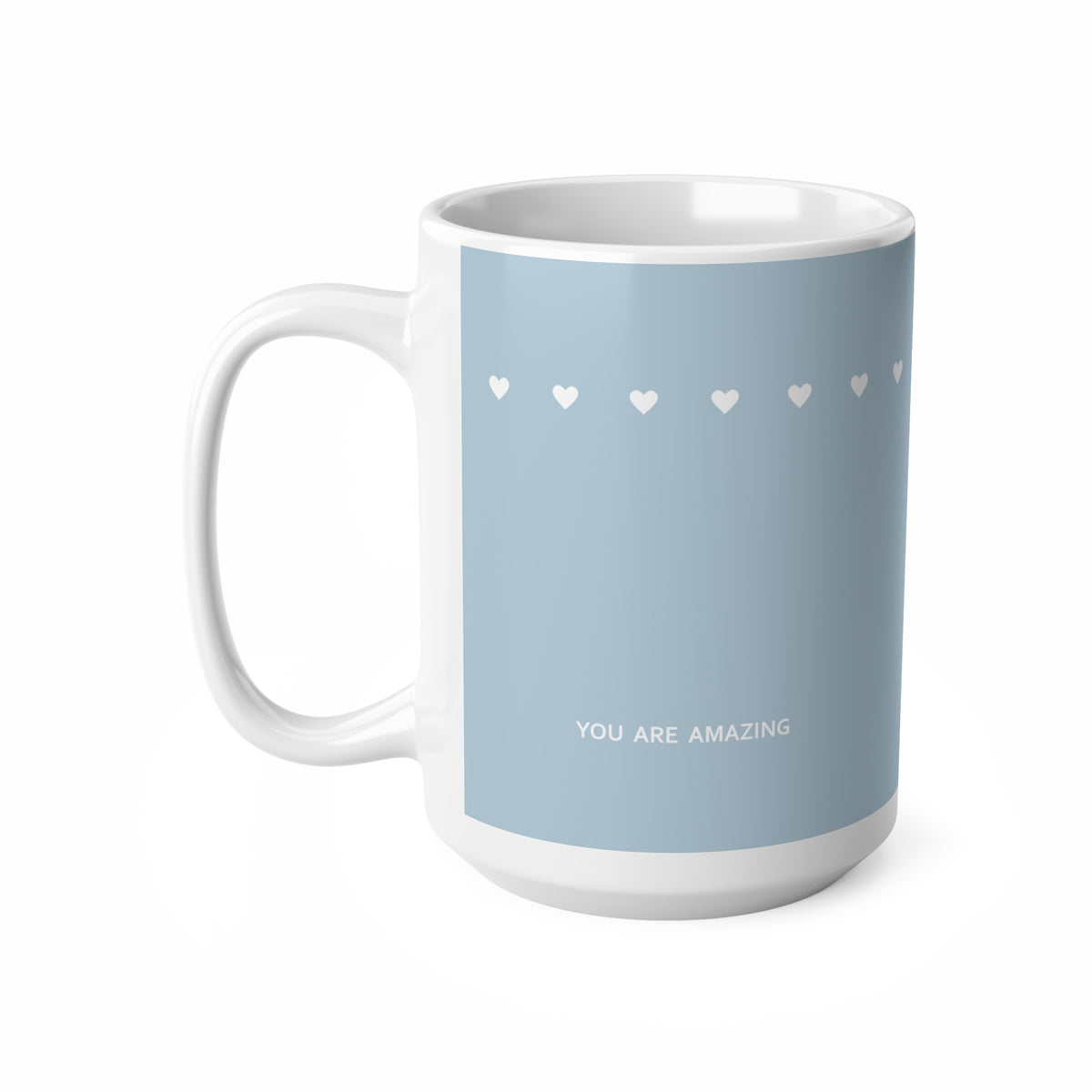 Left side view of blue ceramic tiny hearts mug, 15oz size, showing ‘You are amazing’ text and handle