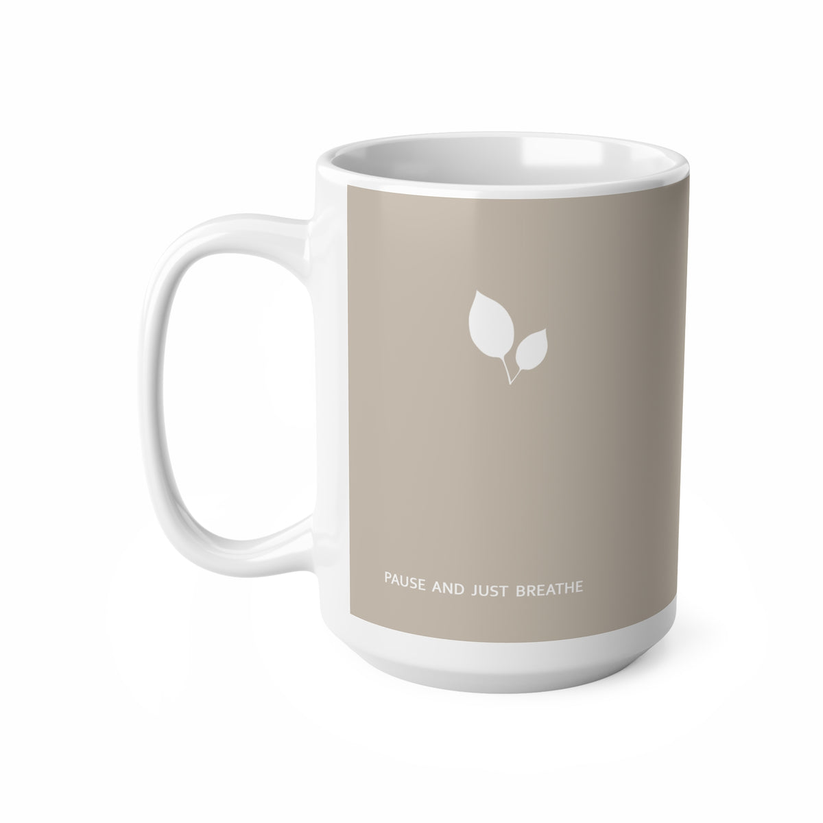 Left side view of brown ceramic leaf mug, 15oz size, showing leaf cluster, ‘Pause and just breathe’ text and handle