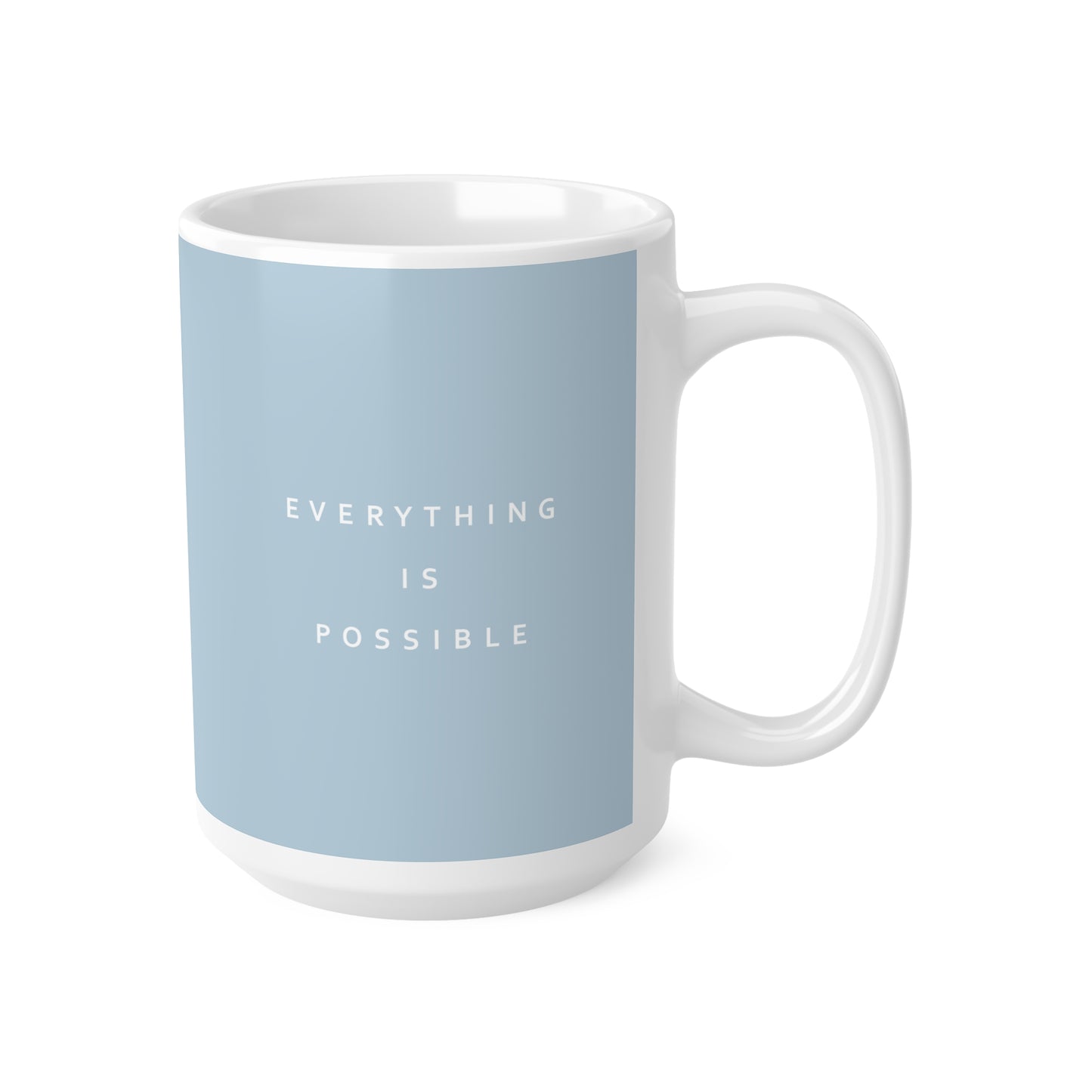 Right side view of blue ceramic minimalist mug, 15oz size, showing ‘Everything is possible’ text and handle