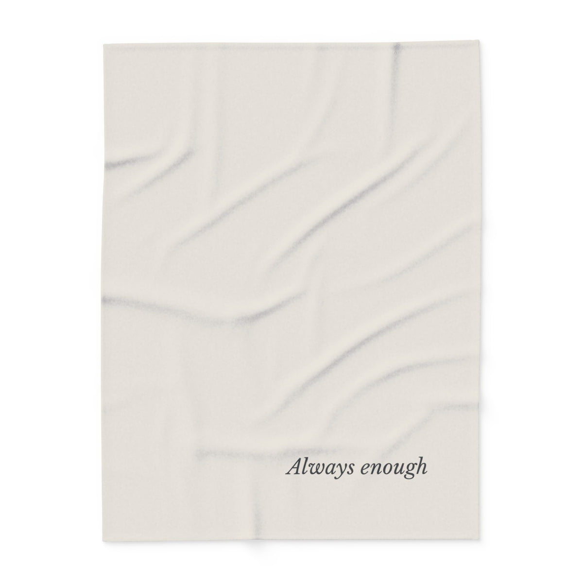 A cream blanket with the phrase 'Always enough' printed in a dark gray cursive font in the bottom right corner, set against a plain white background.
