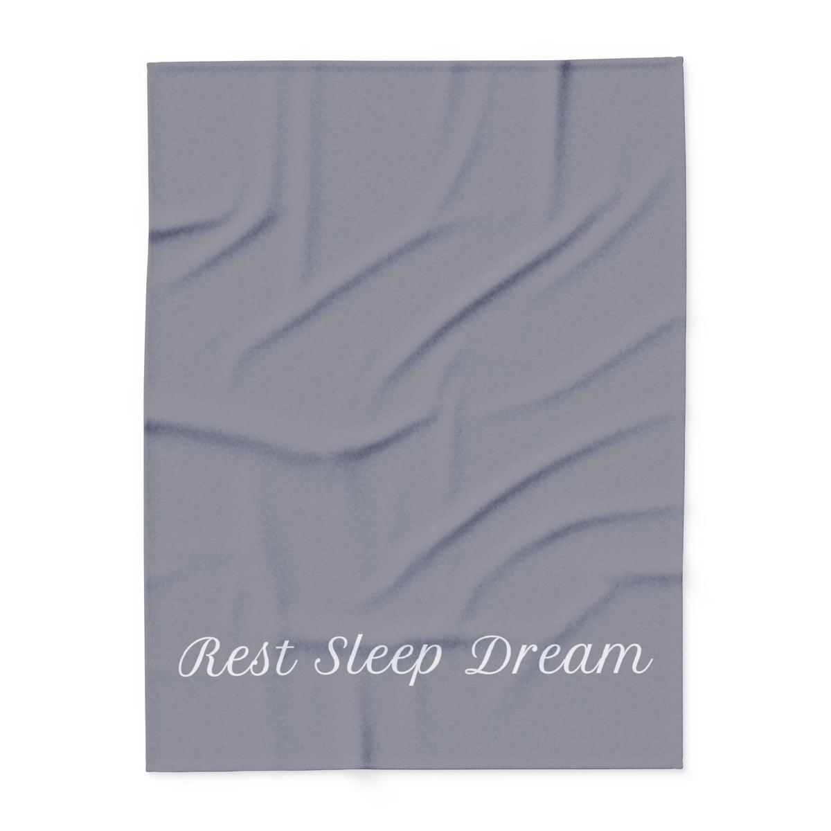 Charcoal grey blanket with large, elegant font in white for the text ‘Rest Sleep Dream’ along the bottom.