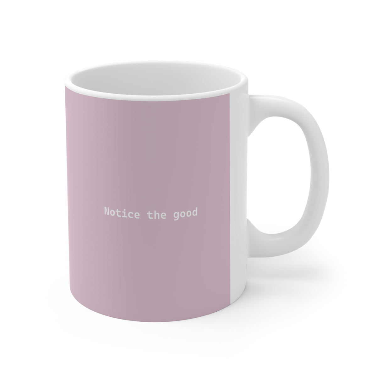 Right side view of pink ceramic minimalist mug, 11oz size, showing ‘Notice the good’ text and handle