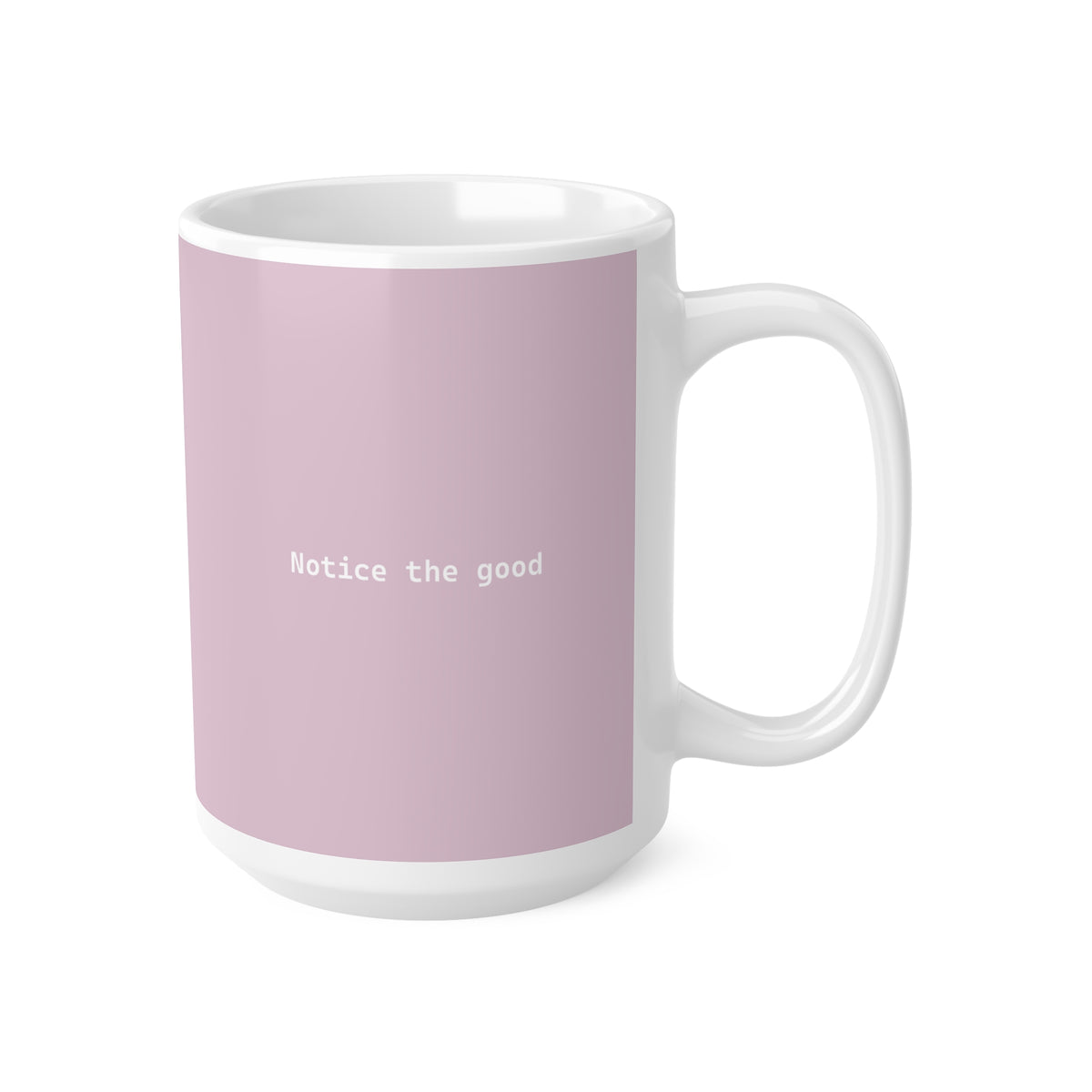 Right side view of pink ceramic minimalist mug, 15oz size, showing ‘Notice the good’ text and handle
