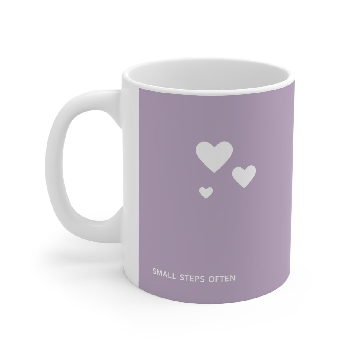 Left side view of purple ceramic white hearts mug, 11oz size, showing ‘Small steps often’ text and handle