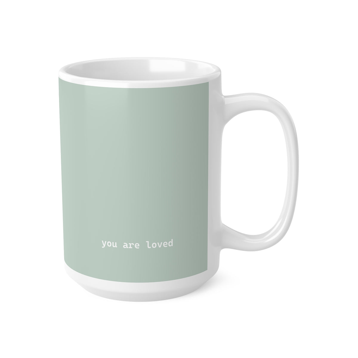Right side view of green ceramic minimalist mug, 15oz size, showing ‘you are loved’ text and handle