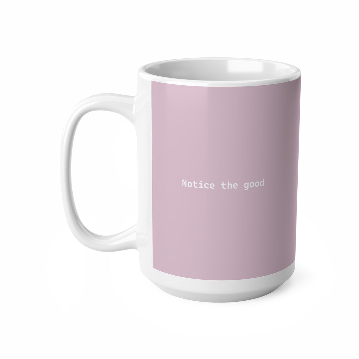 Left side view of pink ceramic minimalist mug, 15oz size, showing ‘Notice the good’ text and handle