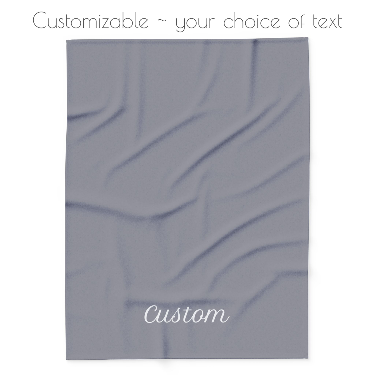 Dark grey blanket with your choice of personalized text. 