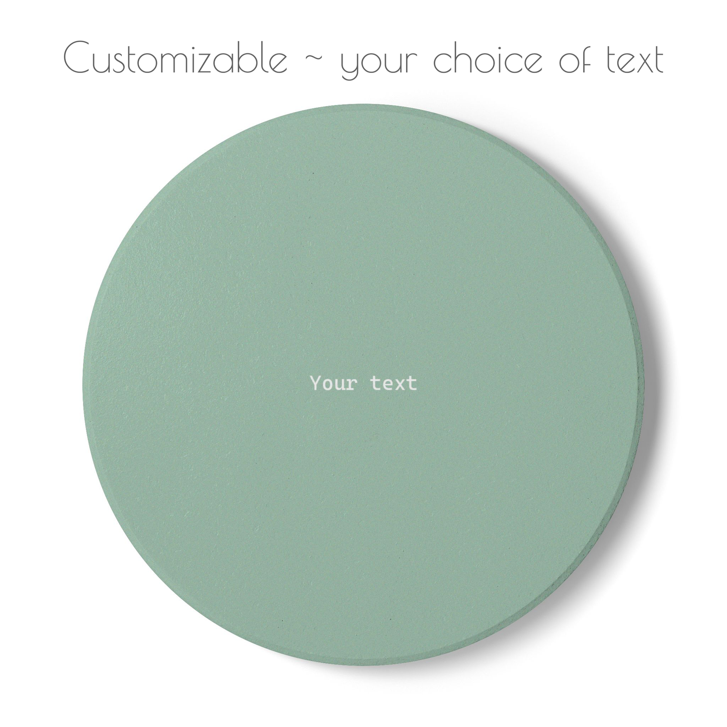 Green round ceramic coaster with your choice of personalized text. 