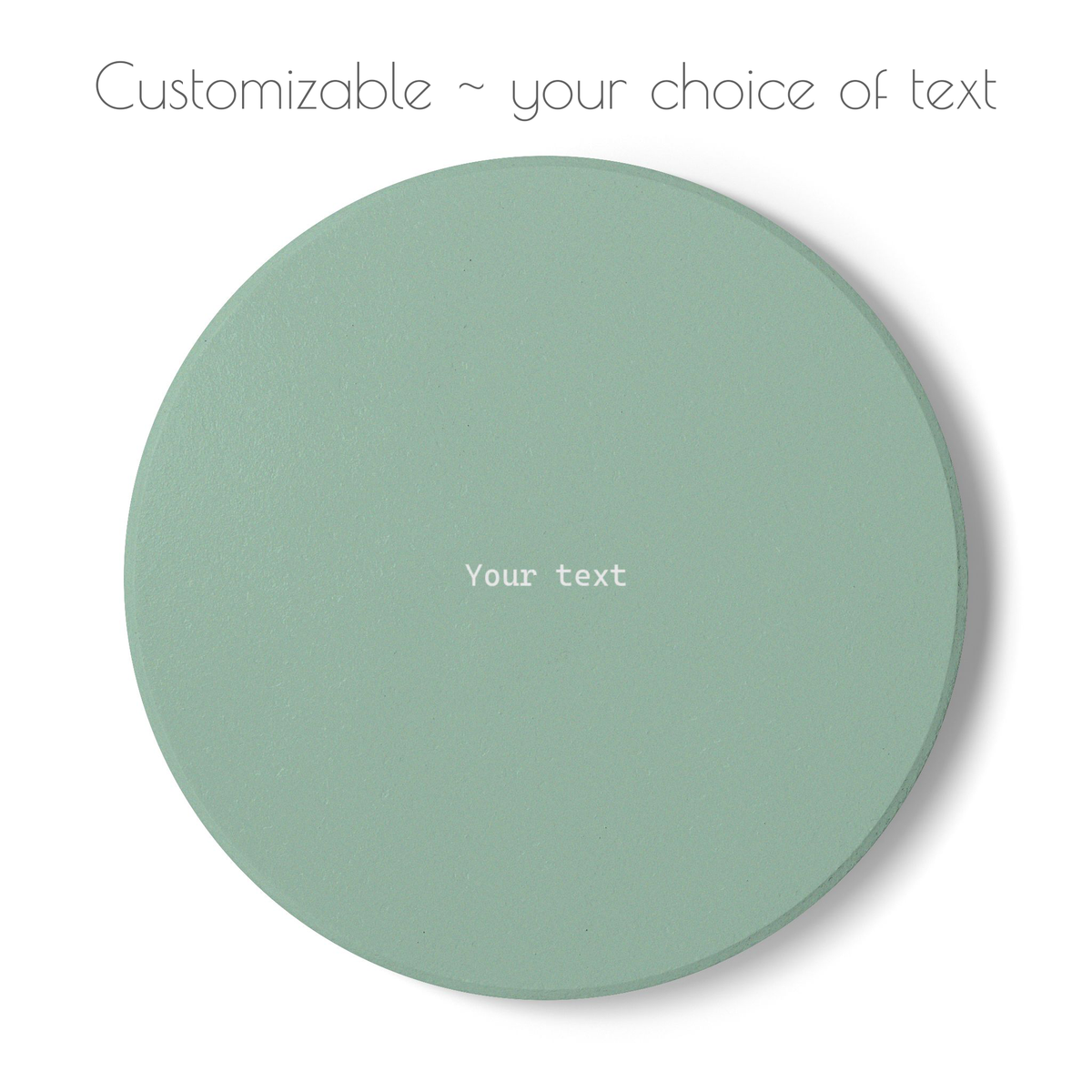 Green round ceramic coaster with your choice of personalized text. 