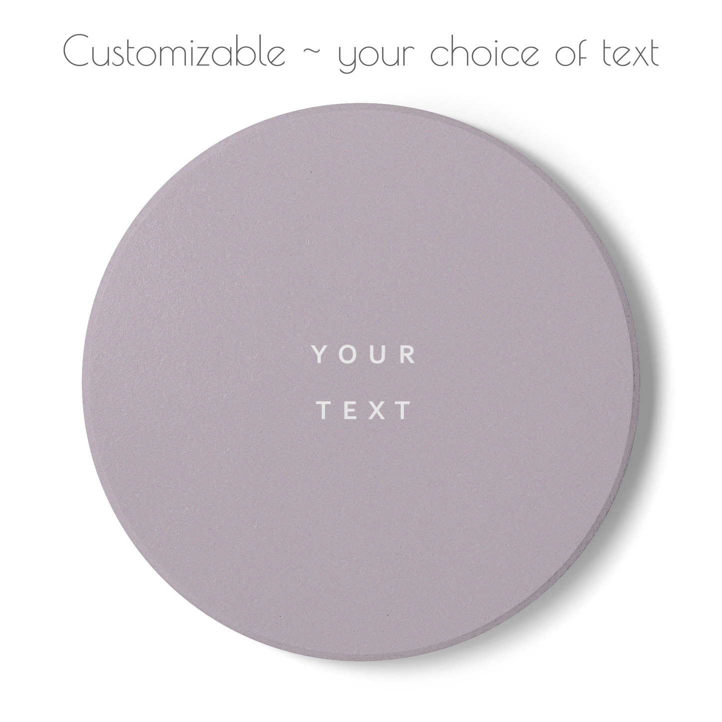 Brown round ceramic coaster with your choice of personalized text. 