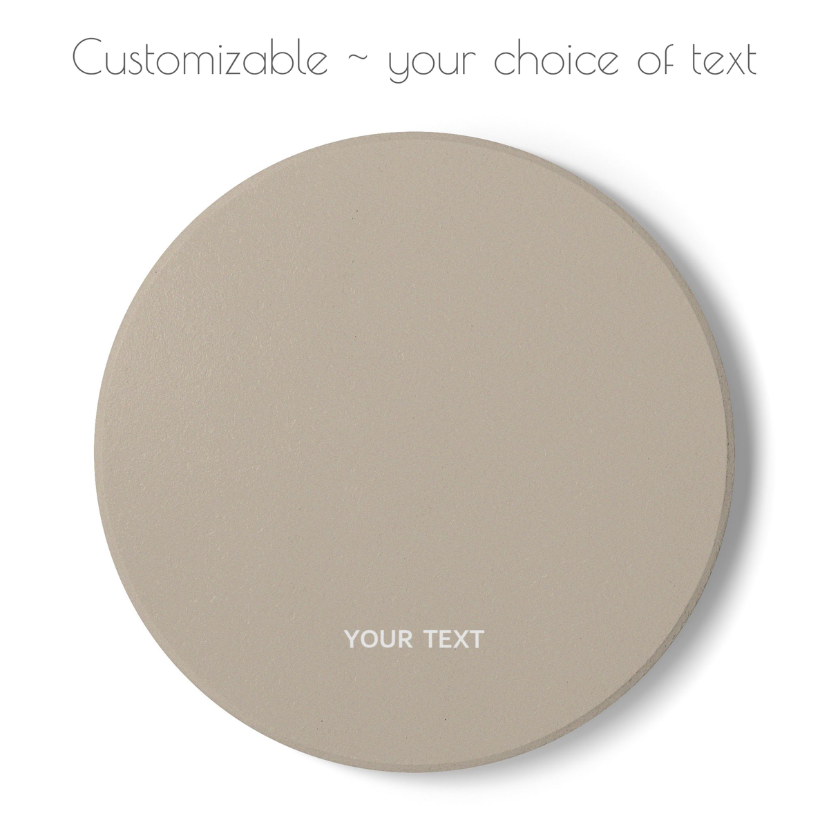 Beige round ceramic coaster with your choice of personalized text. 
