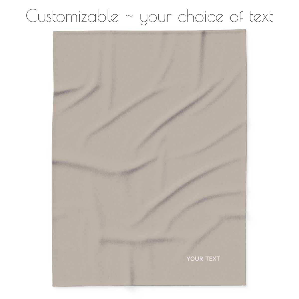 Beige blanket with your choice of personalized text. 