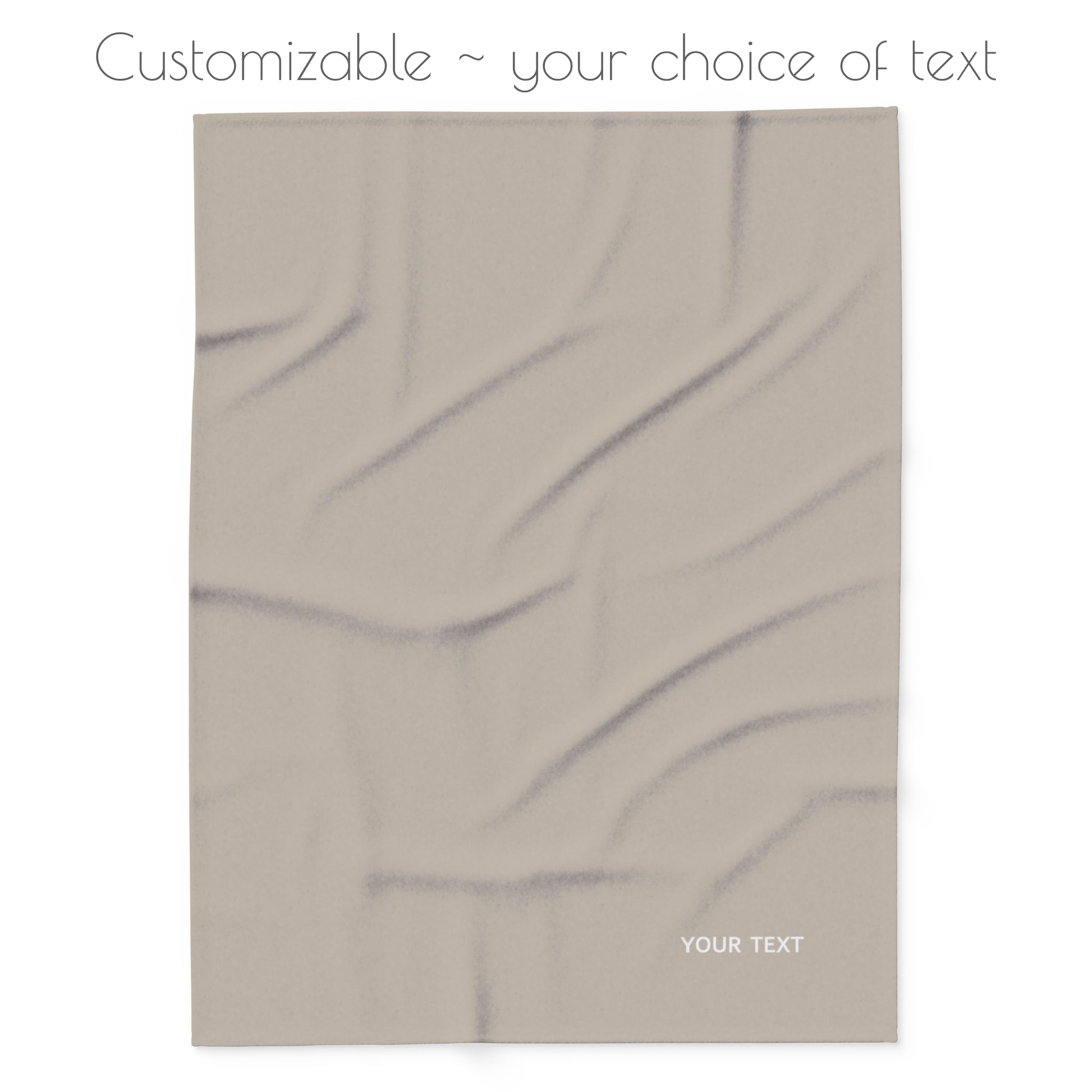 Beige blanket with your choice of personalized text. 