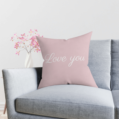 pink cushion with the words, love you