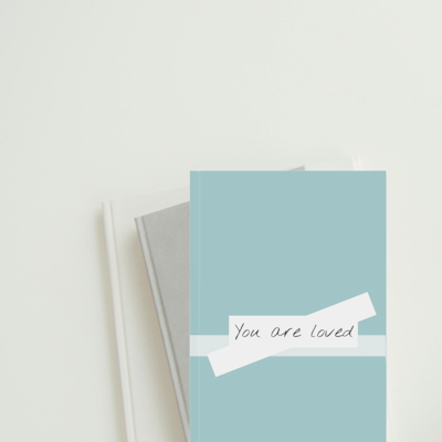 teal bow journal with the words, you are loved