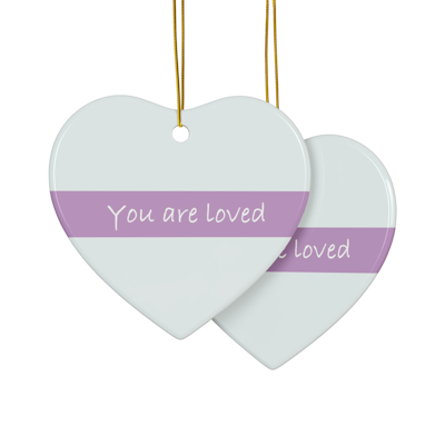 white and purple heart ceramic ornament with the words, you are loved