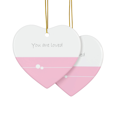 pink and white heart ceramic ornament with delicate circle design, and the words, you are loved