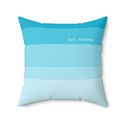 blue striped square decorative pillow with words, just breathe.