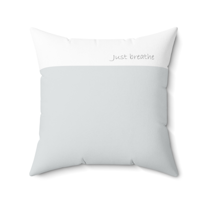 grey and white square decorative pillow, with words, just breathe.
